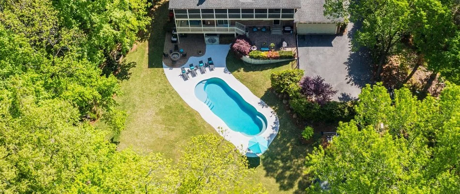 Drone image of pool and patio in Big Cove, AL.