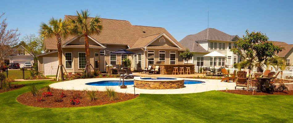 Large backyard with pool and patio in Scottsboro, AL. 