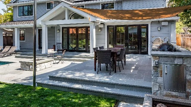 Backyard in Winchester, TN with patio and outdoor kitchen.